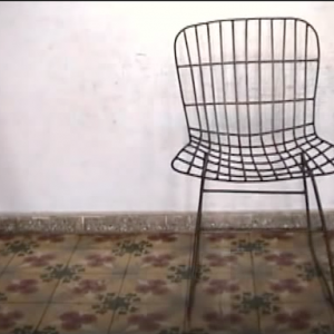 78 versions of Harry Bertoia's chair Model No. 420C, found in Aguacate, Cuba. Oct/2006.flv